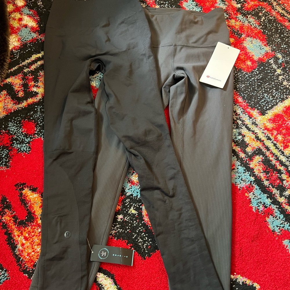 TWO size 4 NWT Lulu lemon leggings. Active wear